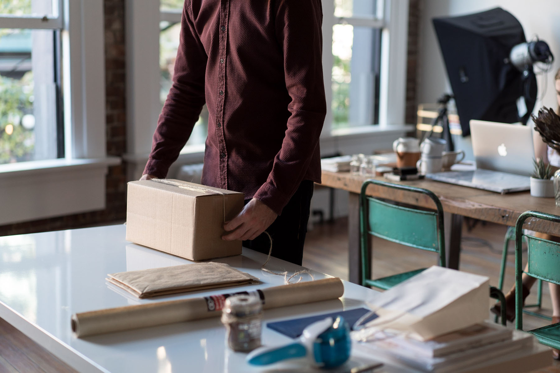 Office worker handling project materials, representing R&D tax credits for innovative projects
