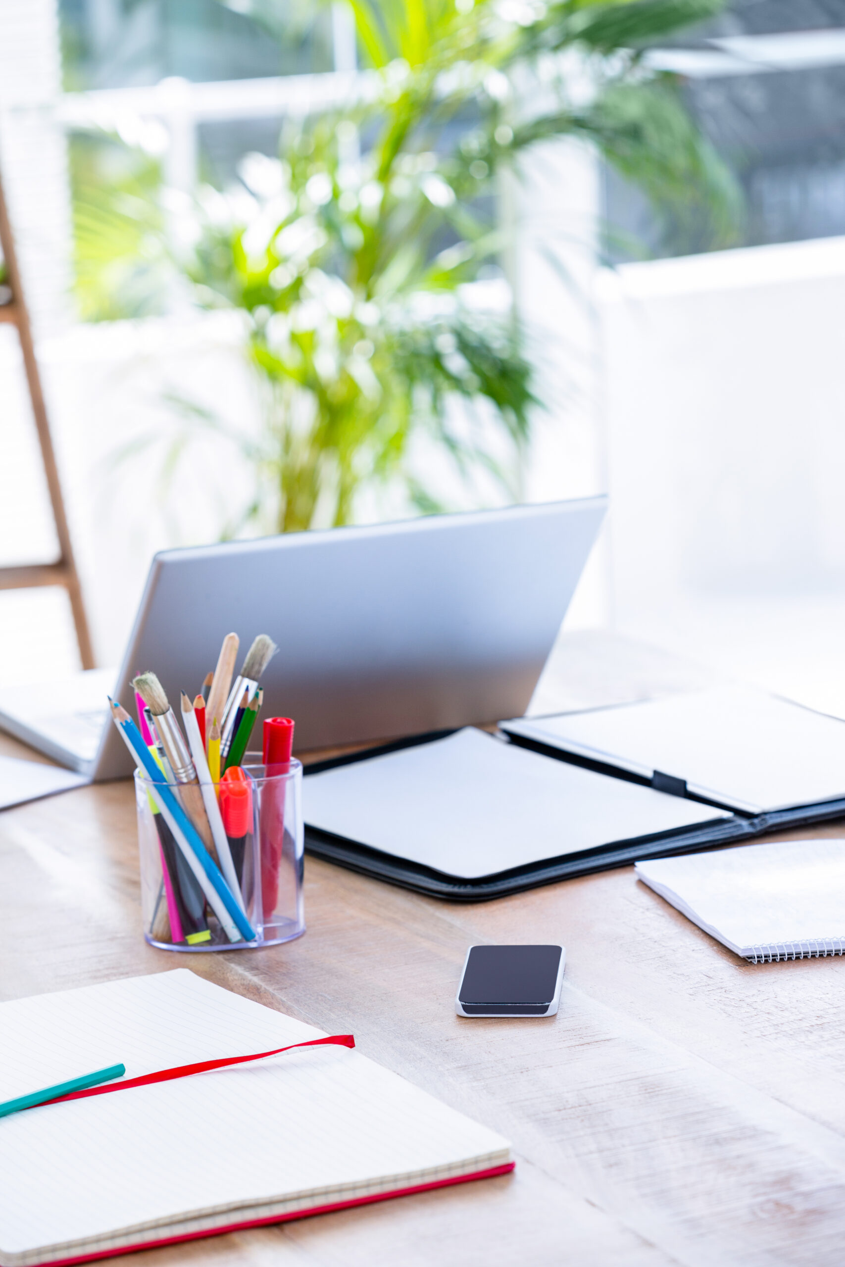 a laptop computer on desk in office