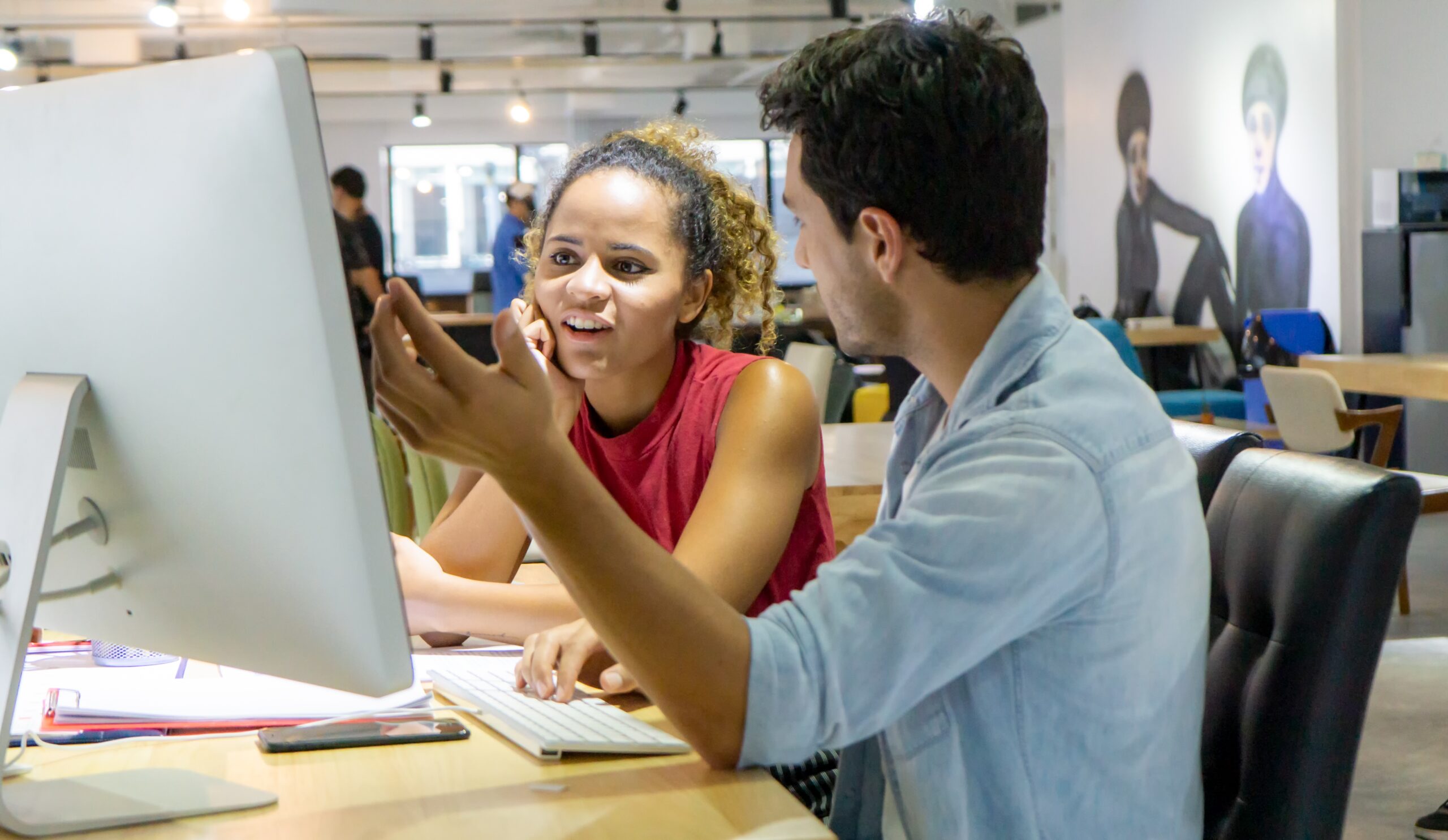 Business people discuss start up ideas in office 