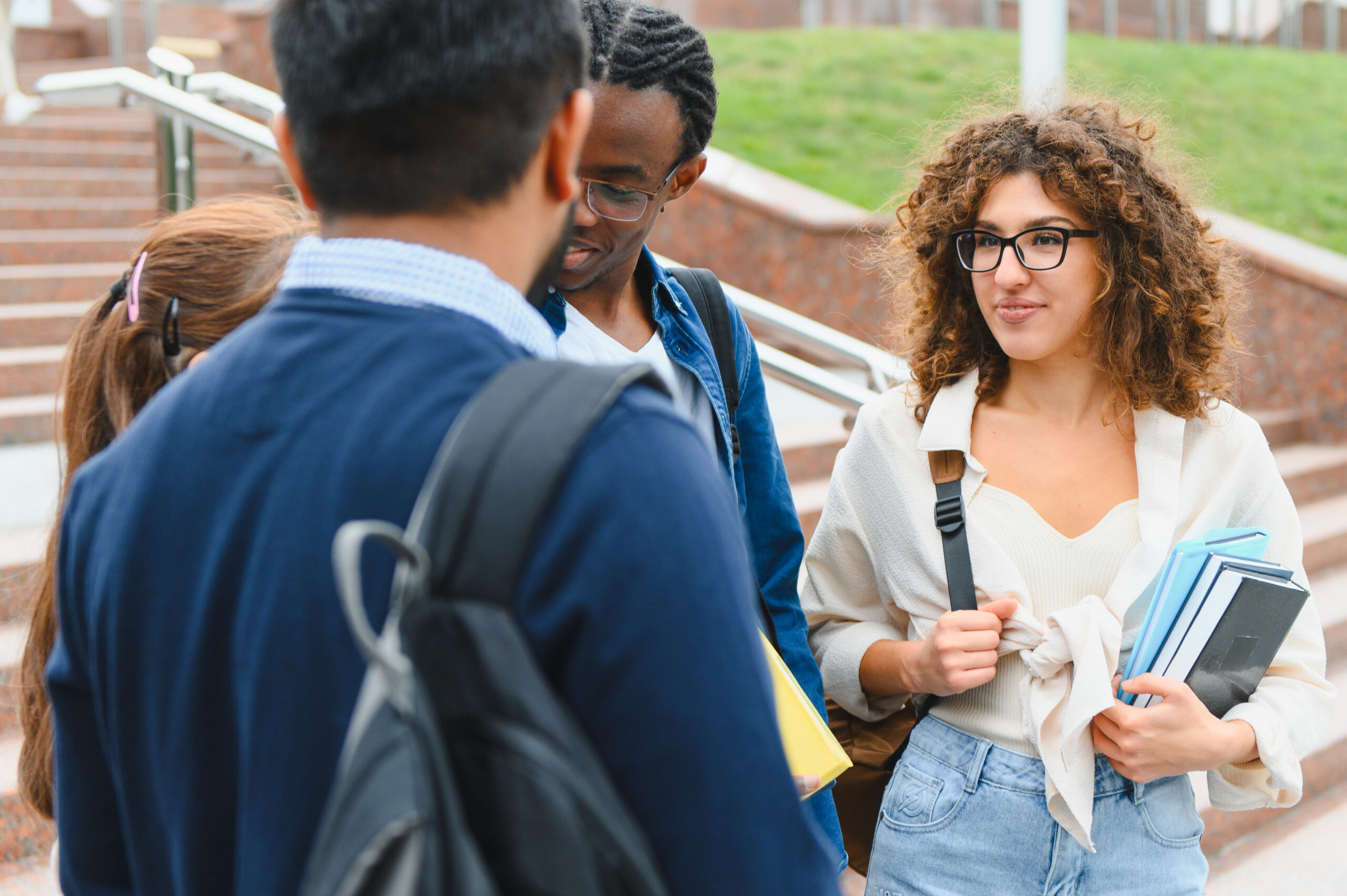 diverse-students-discussing-on-university-campus