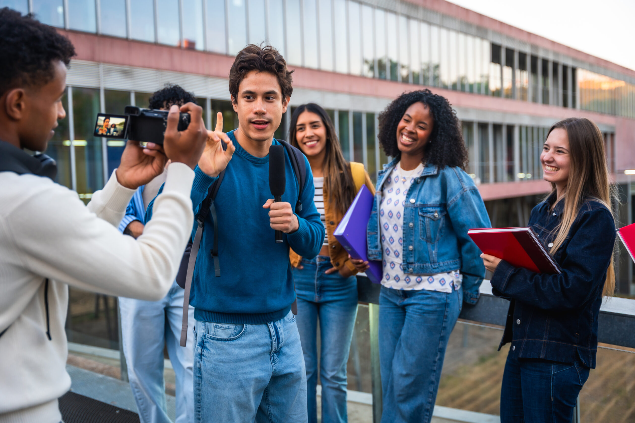 diverse-students-vlogging-on-campus-sharing-unive