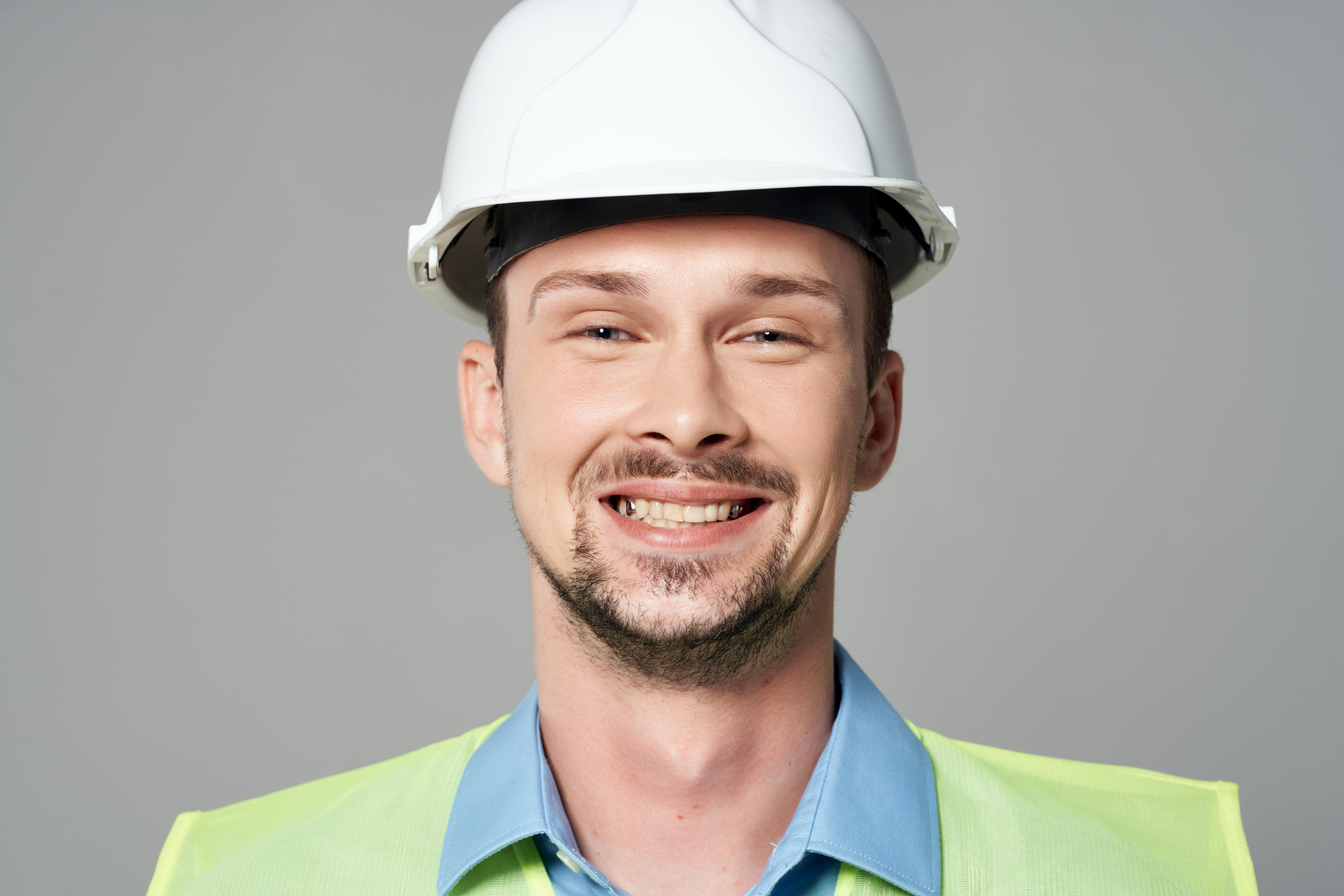 man in construction uniform facing the camera
