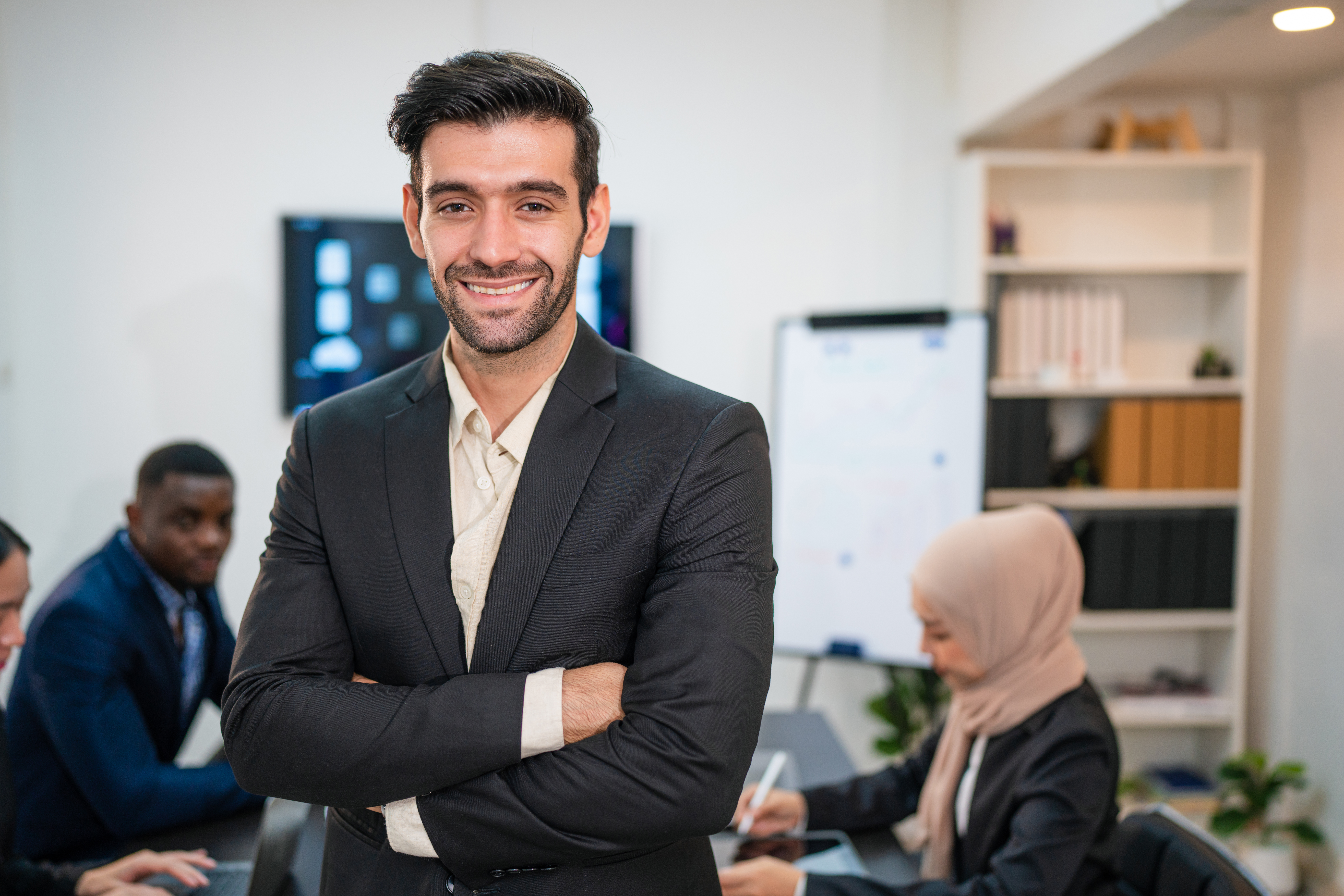 successful businessman working and looking at the camera